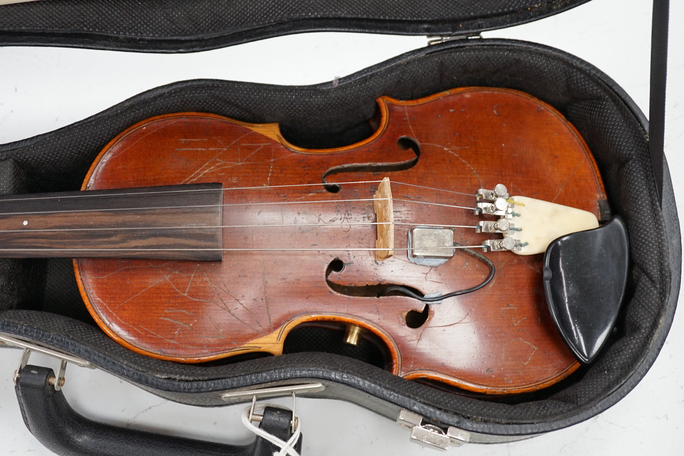 An unusual travelling violin (Pochette), length of body, 25.5cm, with standard length neck, with shorter 53.5cm bow and fitted case, overall length of violin 55cm